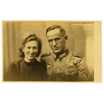 Studio photo of a German Gefreiter in m36 Feldbluse with his wife. Espenlaub militaria